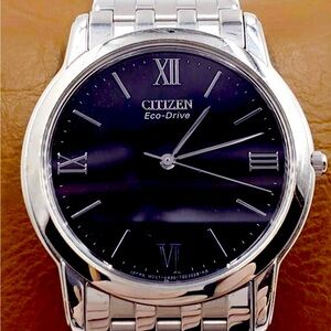 Classic men's Citizen Eco-drive watch. Quartz analog movement.